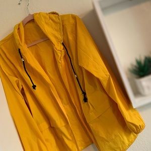 Yellow thin rain shell jacket